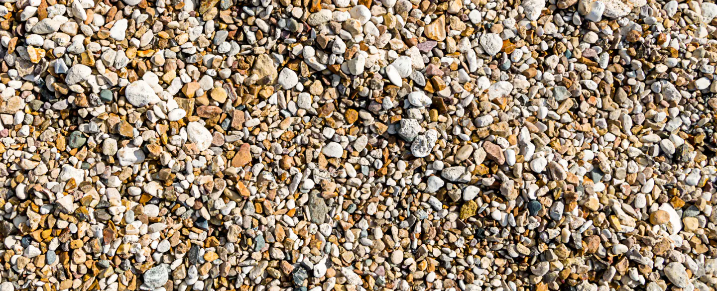 gravel base of yellow beige and white colored stones